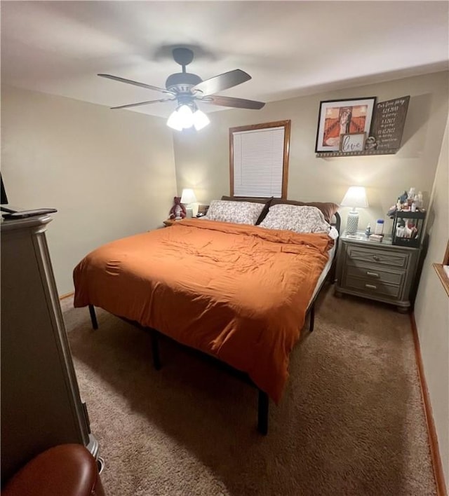 carpeted bedroom featuring a ceiling fan