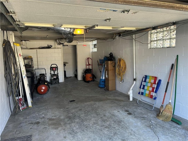 garage featuring concrete block wall