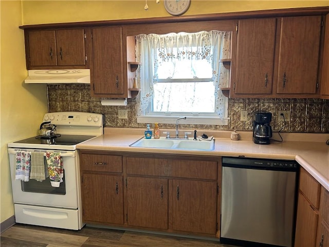 kitchen featuring open shelves, under cabinet range hood, dishwasher, white electric range oven, and a sink