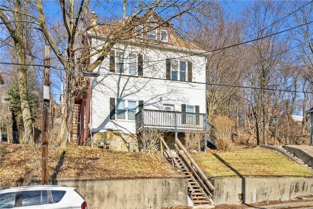 american foursquare style home featuring stairway