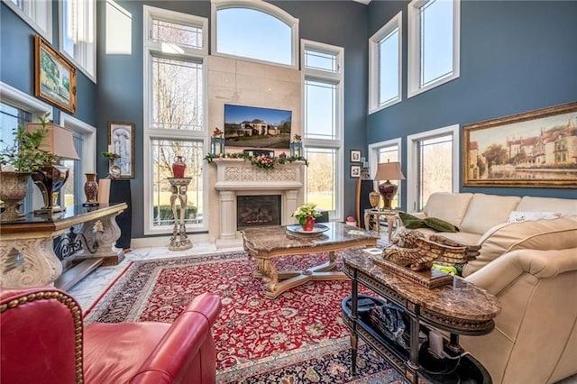 4605 Whippoorwill Dr, Hermitage, PA 16148 - living room with a towering ceiling and a fireplace with raised hearth