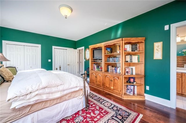 4605 Whippoorwill Dr, Hermitage, PA 16148 - bedroom with two closets, wood finished floors, and connected bathroom