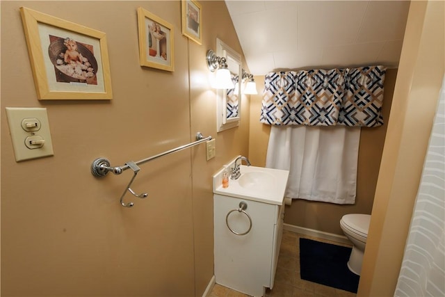 bathroom with toilet and vanity