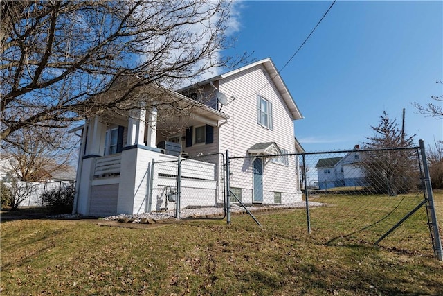 view of property exterior with a lawn, fence, a garage, and a gate