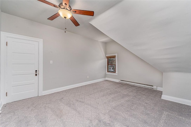 bonus room with carpet, baseboards, ceiling fan, vaulted ceiling, and a baseboard heating unit