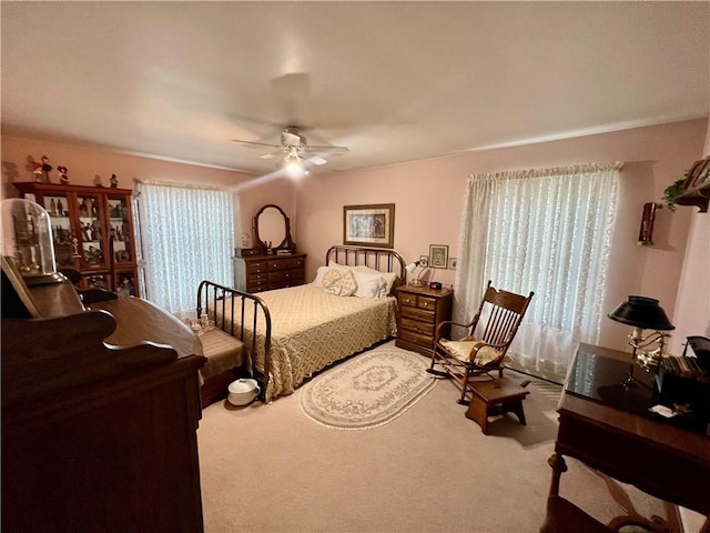 bedroom with carpet floors and ceiling fan