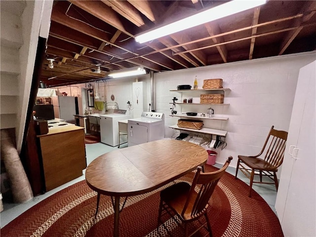 unfinished basement with washing machine and dryer