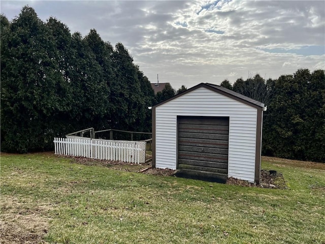 detached garage with fence