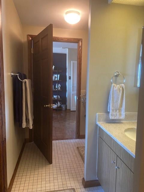 bathroom featuring vanity and tile patterned floors