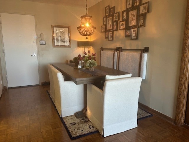 dining room with baseboards