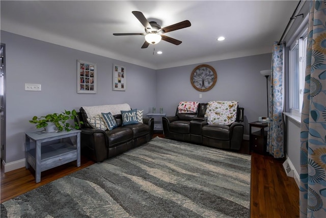 living area featuring recessed lighting, baseboards, wood finished floors, and a ceiling fan