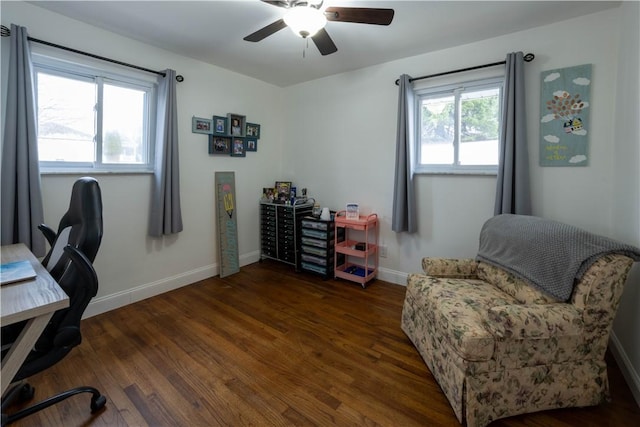 office featuring wood finished floors, baseboards, and ceiling fan