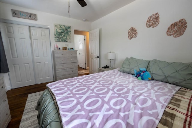 bedroom with a closet, a ceiling fan, and dark wood-style flooring