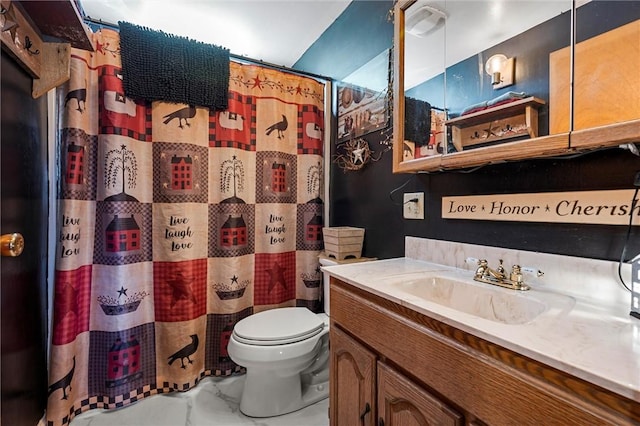 bathroom featuring vanity, toilet, a shower with curtain, and marble finish floor