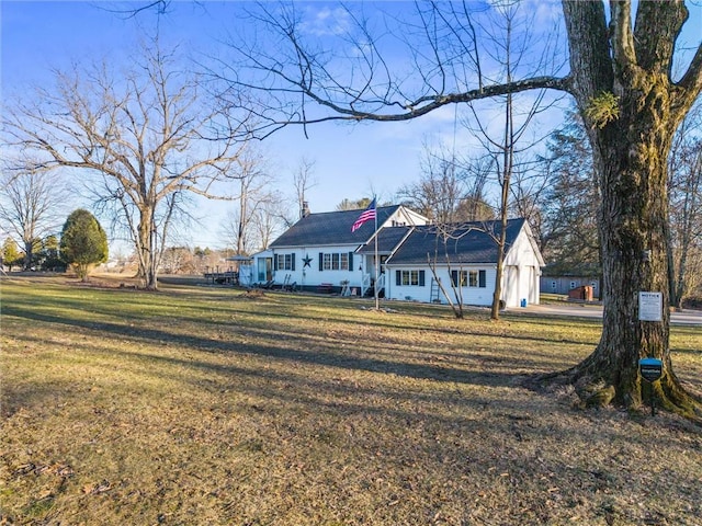 view of front of house with a front lawn