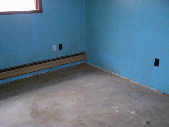 spare room with baseboard heating