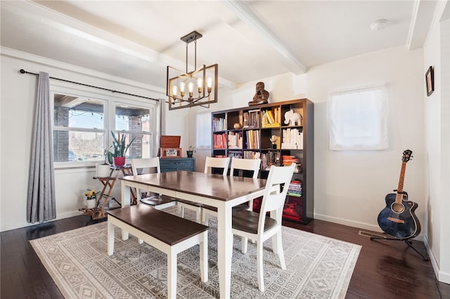 dining space featuring baseboards, beam ceiling, a notable chandelier, and wood finished floors