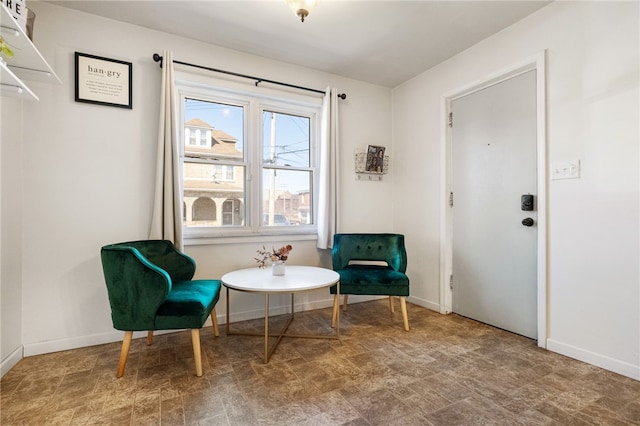 living area with baseboards