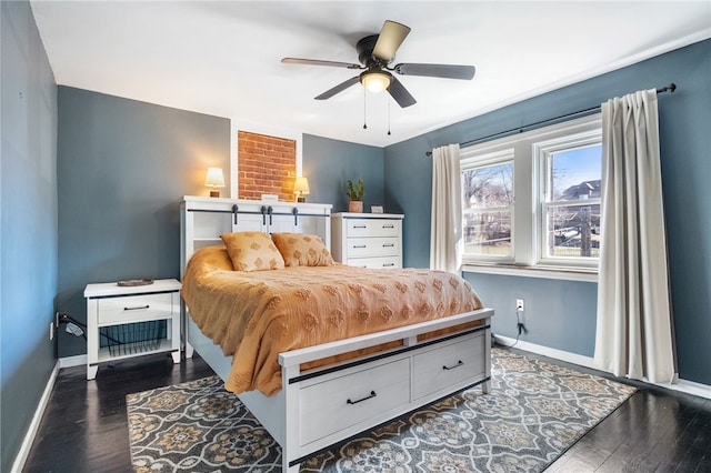 bedroom with baseboards, wood finished floors, and a ceiling fan