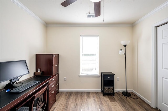 home office with baseboards, crown molding, and light wood finished floors