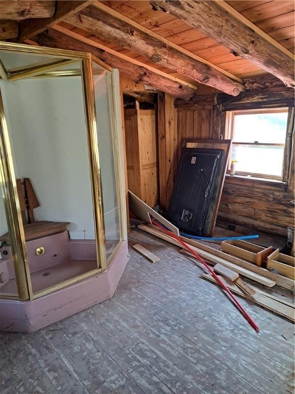 misc room with beamed ceiling and wooden ceiling