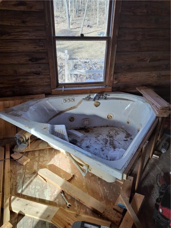 bathroom featuring a jetted tub