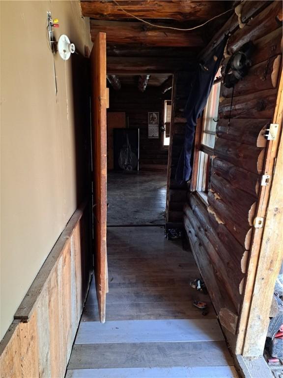 corridor featuring hardwood / wood-style flooring