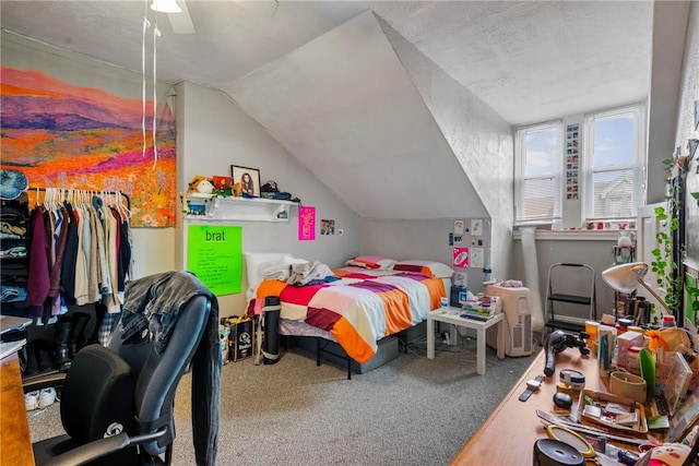 bedroom with lofted ceiling and carpet flooring