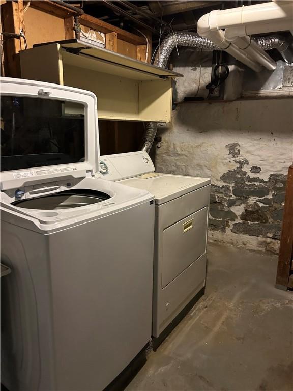 laundry area featuring washing machine and dryer and laundry area