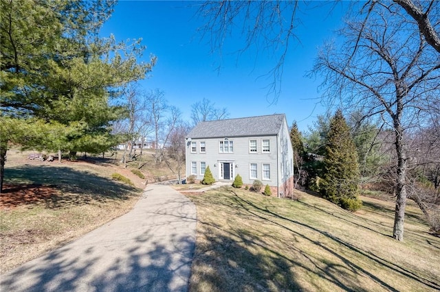 colonial house with a front lawn