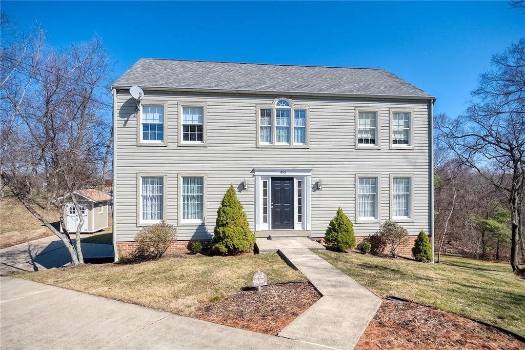 493 Geyser Rd, Robinson Twp Nwa, PA 15205 - colonial home featuring a front yard and roof with shingles