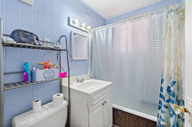 bathroom featuring decorative backsplash, toilet, tile walls, and vanity