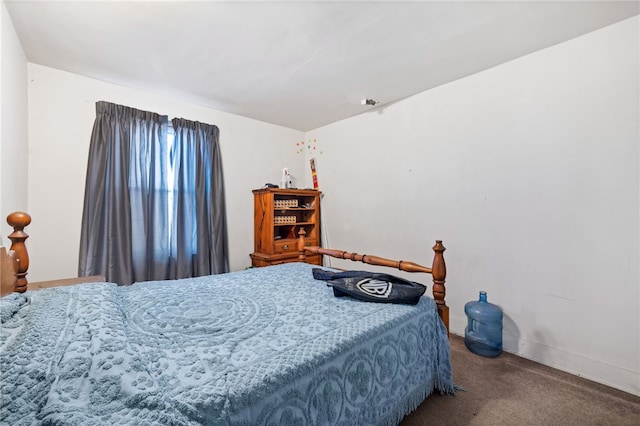 carpeted bedroom with baseboards