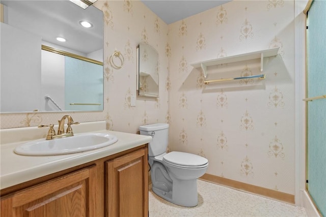 full bathroom featuring toilet, wallpapered walls, and a shower with shower door