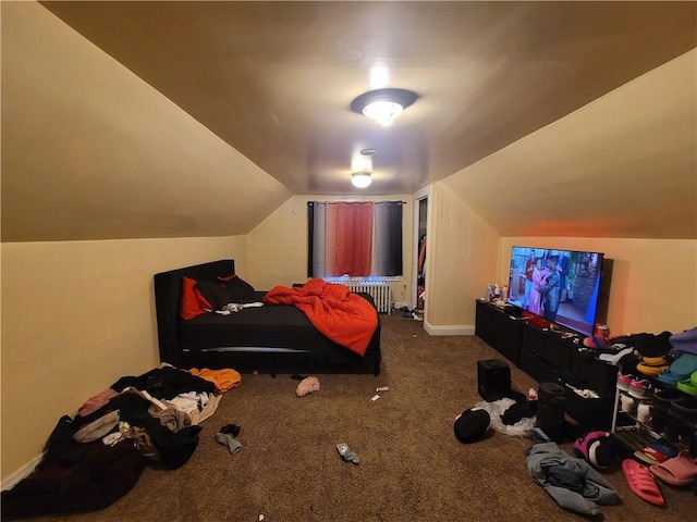 carpeted bedroom featuring baseboards, radiator, and vaulted ceiling