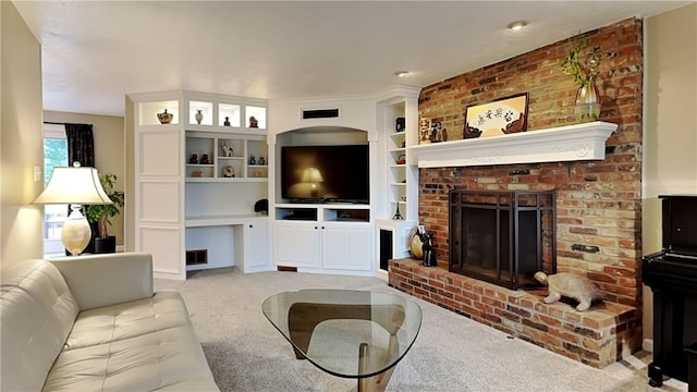 carpeted living area with visible vents and a brick fireplace