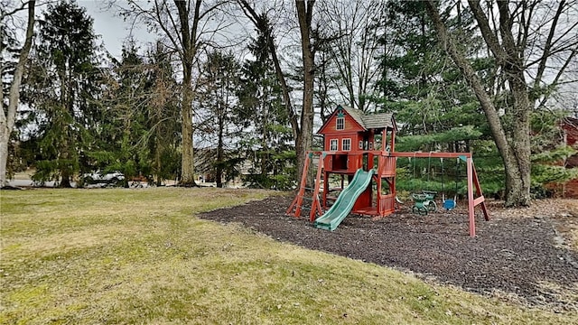 view of jungle gym with a lawn