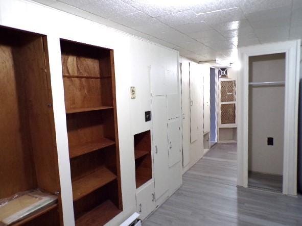 hallway featuring wood finished floors