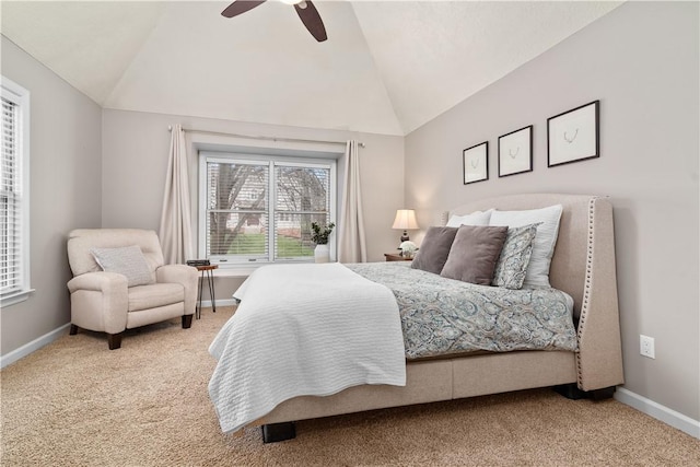 bedroom featuring ceiling fan, baseboards, carpet, and vaulted ceiling