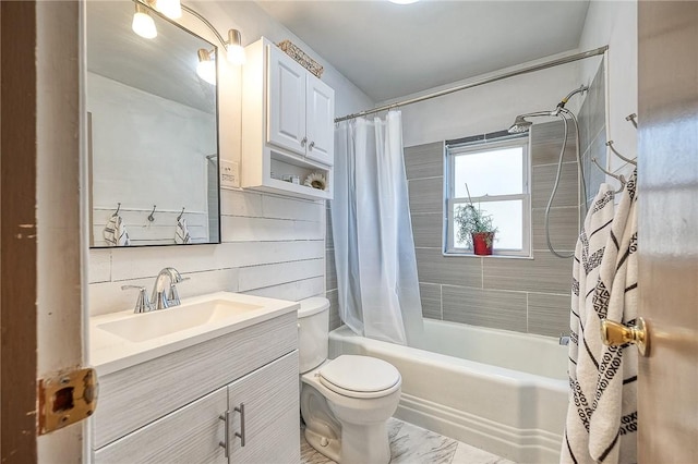 full bath featuring vanity, shower / tub combo, and toilet