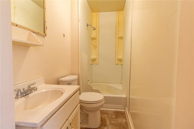 bathroom with tile patterned floors, shower / bathing tub combination, toilet, and vanity