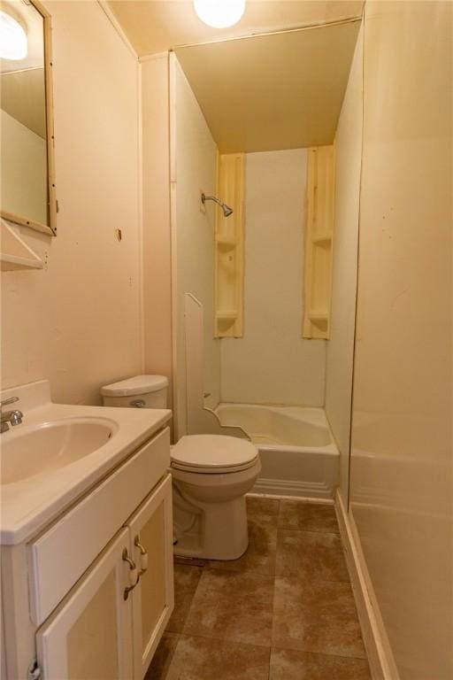 bathroom featuring vanity, toilet, and walk in shower