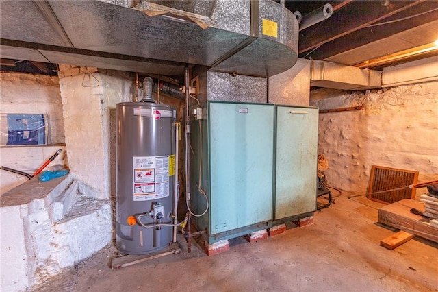 utility room with gas water heater