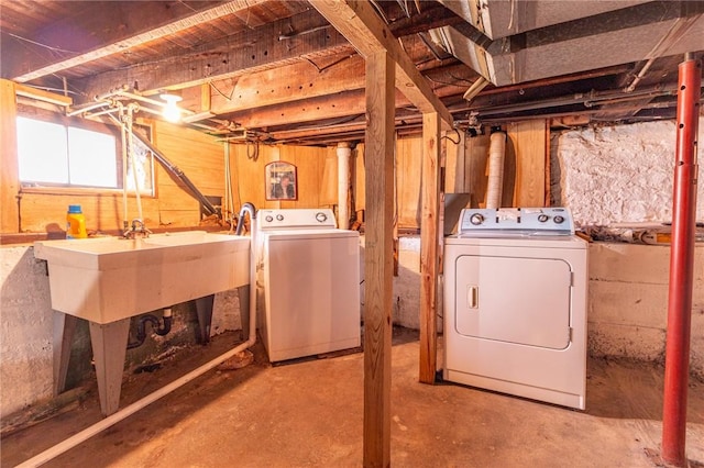 below grade area featuring separate washer and dryer