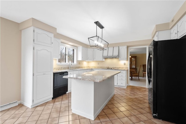 kitchen featuring black appliances, white cabinets, and a center island