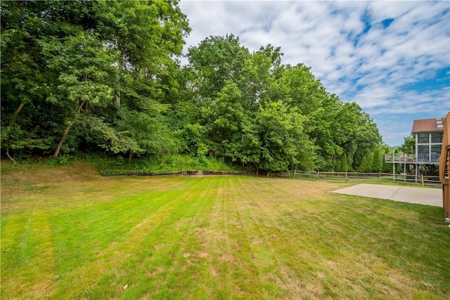 view of yard with fence