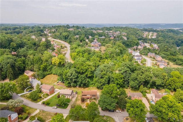 bird's eye view with a forest view and a residential view