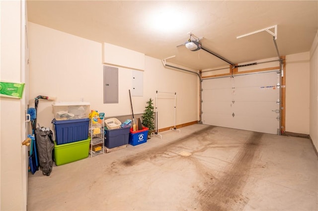 garage featuring electric panel and a garage door opener