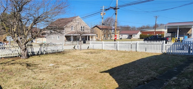 view of yard with a fenced front yard