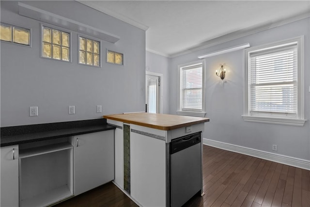 kitchen with dark wood-style floors, crown molding, baseboards, and stainless steel dishwasher